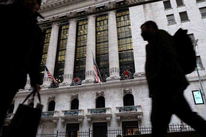 At the New York Stock Exchange, markets were up slightly on the first morning of trading in the new year as Omicron cases begin to subside in South Africa. AFP