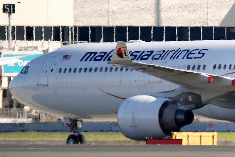 A Malaysia Airlines plane at Sydney Airport. Muhammad Arif was arrested after his flight returned to the airport. AP