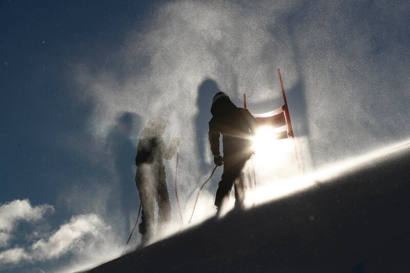 Italian skiers Nadia Delago and Elena Curtoni stand on the starting line of the Alpine Ski FIS World Cup downhill, in Cortina d’Ampezzo, Italy. AP