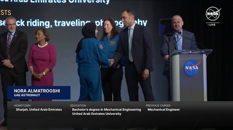 Salem Al Marri, director general of the Mohammed bin Rashid Space Centre, congratulates Emirati astronaut Ms Al Matrooshi for completing her training. Photo: Nasa TV