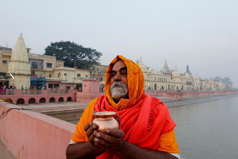 A Hindu holy man offers prayers in Ayodhya ahead of the Supreme Court's decision. AP Photo