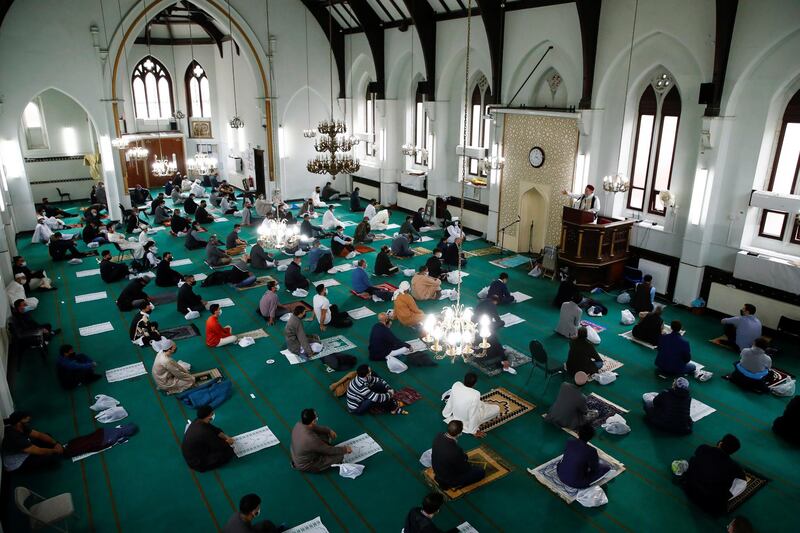 Worshippers attend Eid Al Fitr prayers at Didsbury Central Mosque in Manchester. Reuters