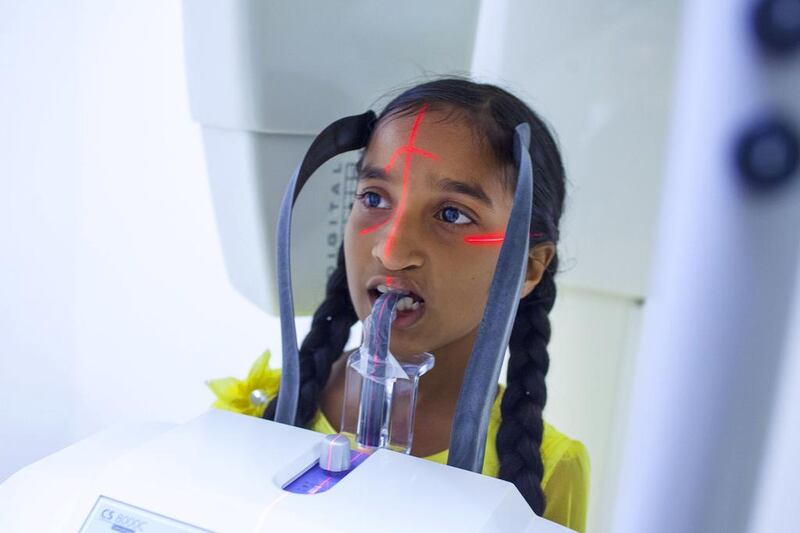 A young patient undergoes an X-Ray at the Aster Medcity Hospital at Kochi. Subhash Sharma for The National