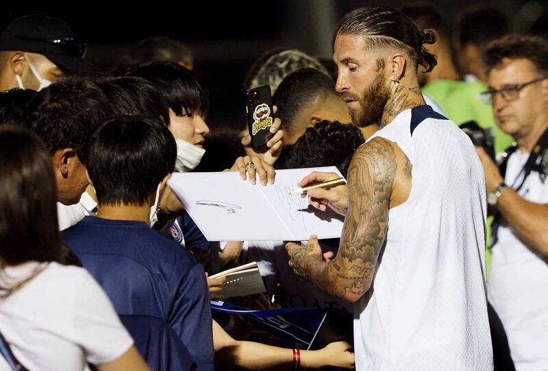 PSG defender Sergio Ramos signs autographs in Tokyo. AFP