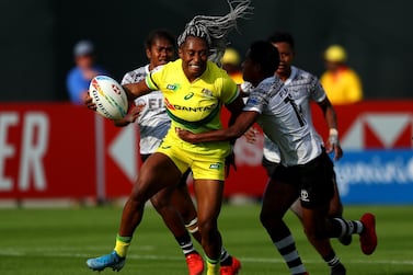 Ellia Green of Australia is tackled by Roela Radiniyavuni of Fiji during day one of the HSBC World Rugby Sevens Series at The Sevens Stadium in Dubai. Getty 