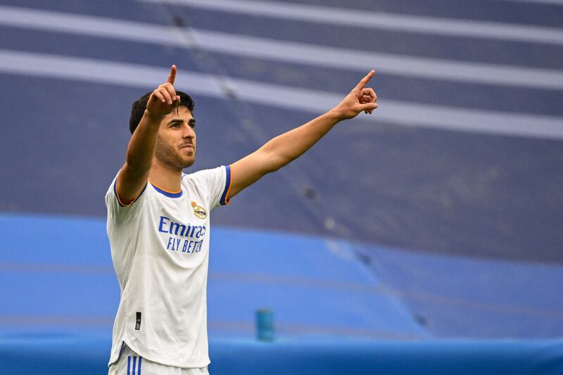 Marco Asensio celebrates after scoring Real's third goal. AFP