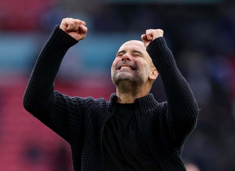 Manchester City manager Pep Guardiola celebrates after the match. Reuters