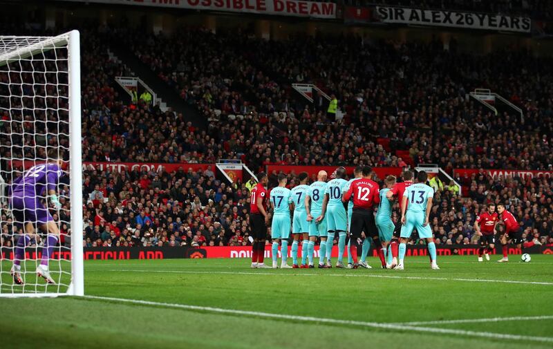 Juan Mata, who came on as a first-half substitute with Manchester United trailing 2-0, lines up a free kick. Reuters