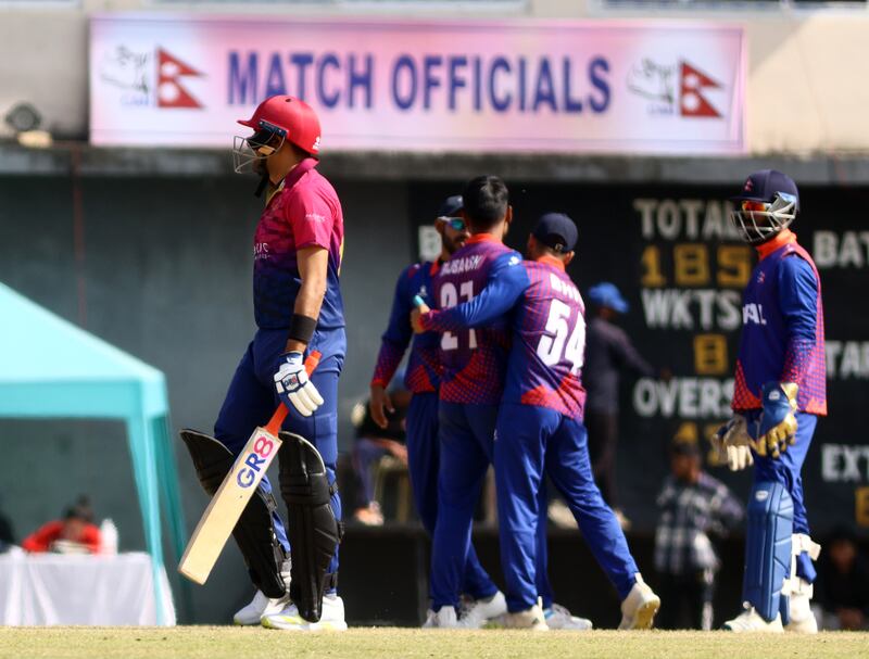 Nepal players celebrate after claiming the wicket of UAE batsman Zahoor Khan during the second one-day international at TU Cricket Ground, on November 16, 2022. Nepal won the game by three wickets. All images: Subas Humagain for The National