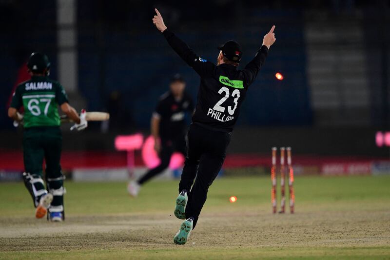 New Zealand's Glenn Phillips celebrates after dismissing Pakistan's Agha Salman. AFP