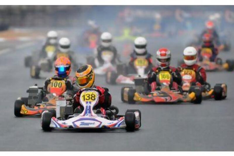 Edward Jones leads the field at the first turn of the Rotax Max Seniors yesterday.