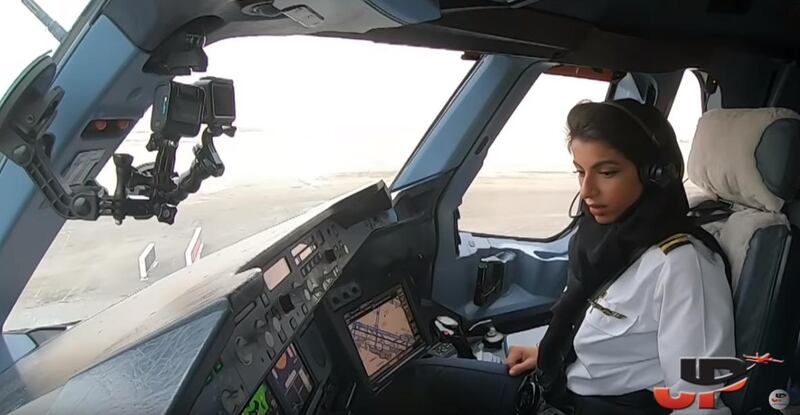 Emirati first officer, Shaima, takes off on flight EY037 on a rainy day from Abu Dhabi to Paris, France. Courtesy JustPlanes