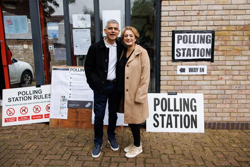 Mayor of London Sadiq Khan and his wife Saadiya arrive at a polling station to vote in local elections. EPA