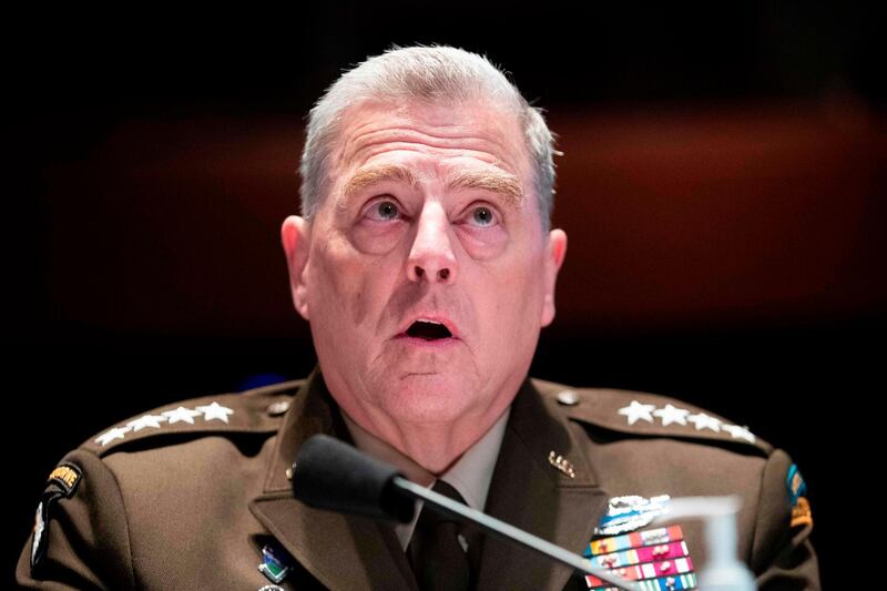 (FILES) In this file photo Chairman of the Joint Chiefs of Staff General Mark Milley appears before a House Armed Services Committee hearing July 9, 2020 on "Department of Defense Authorities and Roles Related to Civilian Law Enforcement," in Washington, DC.  The US military is proceeding with President Donald Trump's order to slash troops in Afghanistan to 2,500 by mid-January, the Pentagon's top general said on December 2, 2020, calling the situation on the ground a "strategic stalemate." Joint Chiefs Chairman General Mark Milley, who earlier appeared opposed to cuts on the estimated 4,500 US troops currently there, said the United States had been successful "to a large measure" at its original goal of hitting Al-Qaeda after the September 11, 2001 attacks. 
 / AFP / POOL / MICHAEL REYNOLDS
