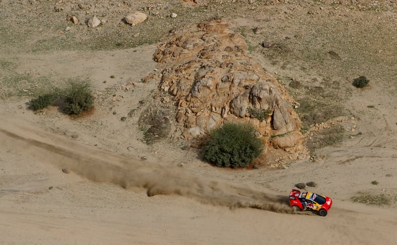 Bahrain Raid Xtreme's Sebastien Loeb and co-driver Fabian Lurquin in action during Stage 1. Reuters