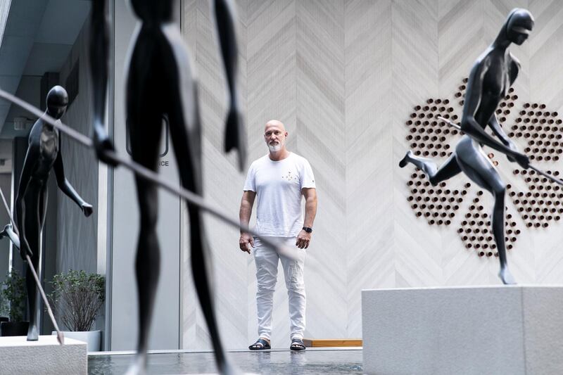 DUBAI, UNITED ARAB EMIRATES - SEPTEMBER 18, 2018. 

Sculptor Antonio Signorini with his work  "The Warriors" at DIFC.

(Photo by Reem Mohammed/The National)

Reporter: Melissa Gronlund
Section: AC