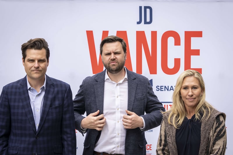 Congressman Matt Gaetz, JD Vance and Congresswoman Marjorie Taylor Greene, left to right, speaking to the press after a campaign rally at The Trout Club in Newark, Ohio.  Getty Images / AFP

