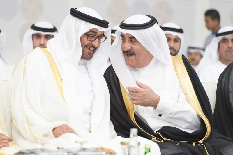 (L-R) Sheikh Mohammed bin Zayed, Crown Prince of Abu Dhabi and Deputy Supreme Commander of the Armed Forces and Sheikh Saud bin Rashid Al Mu’alla, Ruler of Umm Al Quwain, attend a group wedding reception for Dr Sheikh Khaled bin Sultan bin Zayed (not shown) and other grooms, at Mushrif Palace. Mohamed Al Suwaidi / Crown Prince Court - Abu Dhabi