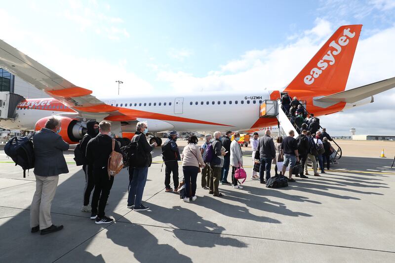 EasyJet has cut 40 daily flights to and from UK airports until the end of June. PA