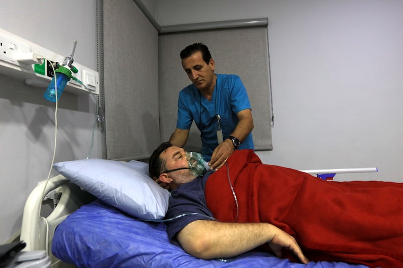 A man injured in the explosion receives medical care at the Jordanian Islamic Hospital in Aqaba. EPA
