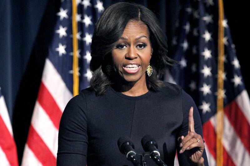 Michelle Obama has defended Clint Eastwood's latest movie American Sniper. Jacquelyn Martin / AP