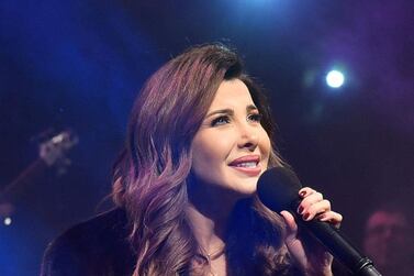 Lebanese singer Nancy Ajram performs during the Annual charity concert hosted by the German University in Cairo, Egypt, 14 December 2019. EPA-EFE