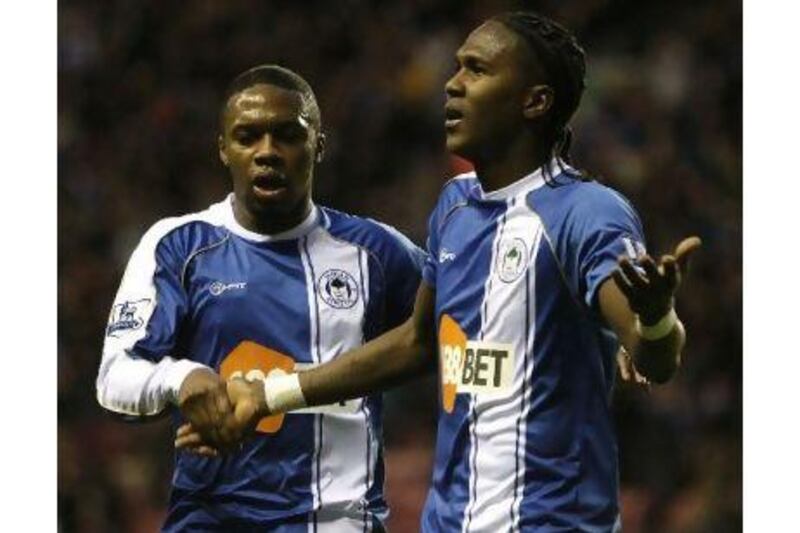 Charles N'Zogbia, left, and Hugo Rodallega have combined well for Wigan Athletic. Peter Byrne / PA Wire