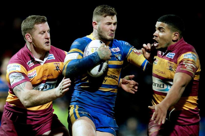 A Super League clash between Leeds Rhinos, in blue, and Huddersfield Giants. The region could be a suitable venue for a future Rugby League World Cup. Daniel L Smith / Getty Images