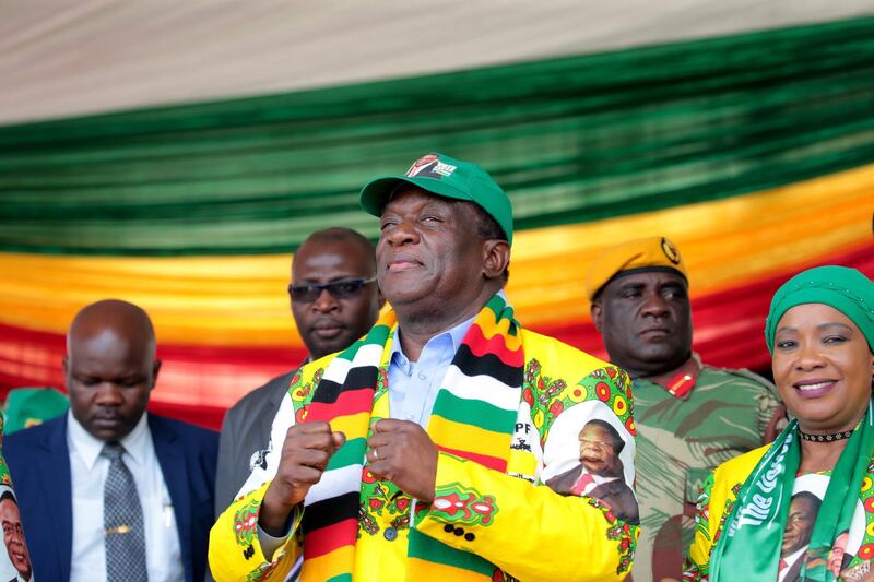 epa06750604 Zimbabwean President Emmerson Mnangagwa and leader of the ruling Zimbabwe African National Union Patriotic Front (Zanu PF) addresses a crowd at a campaign rally at Sakubva Stadium in Mutare about 260 km east of Harare,Zimbabwe, 19 May 2018. Mnangagwa who has promised a fair and free election said that an exact election date will be announced in two weeks.  EPA/AARON UFUMELI