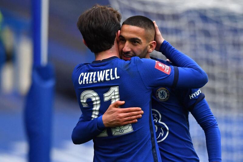 Chelsea's midfielder Hakim Ziyech celebrates with Ben Chilwell after scoring their late second goal during the FA Cup quarter-final against Sheffield United at Stamford Bridge on Sunday, March 21, 2021. AFP