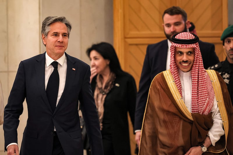 Prince Faisal escorts Mr Blinken as they arrive for a meeting with GCC ministers in Riyadh. AFP