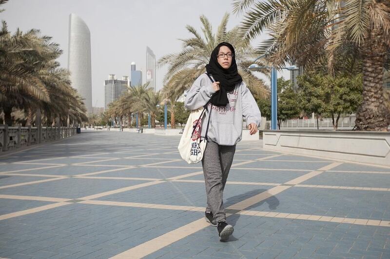 Leila Luqman, a 19-year-old student, walks along the Corniche to stay healthy. Mona Al Marzooqi / The National