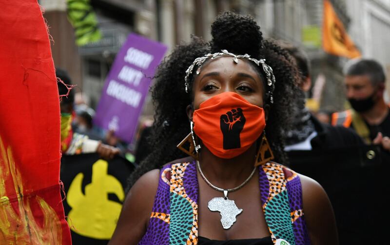 Protesters demonstrate outside the Bank of England on Friday. EPA