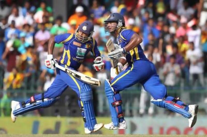 Kumar Sangakkara, right, and Mahela Jayawardene, left, have been stalwarts in the Sri Lanka team for over a decade. Gemunu Amarasinghe / AP Photo