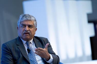 Nandan Nilekani, co-founder and chairman of Infosys, speaking at a panel discussion during the International Monetary Fund and World Bank Group annual meeting in Washington. Bloomberg