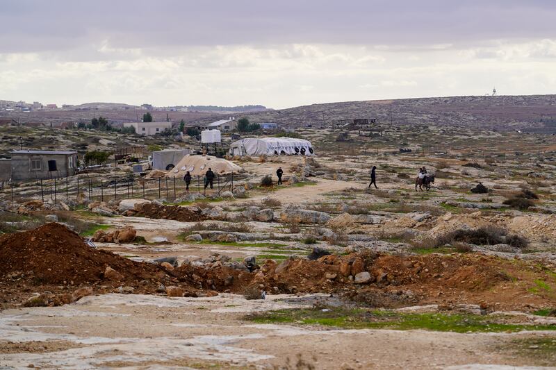 Palestinians are forced to graze their animals on land adjoining the Israeli settlement of Susya