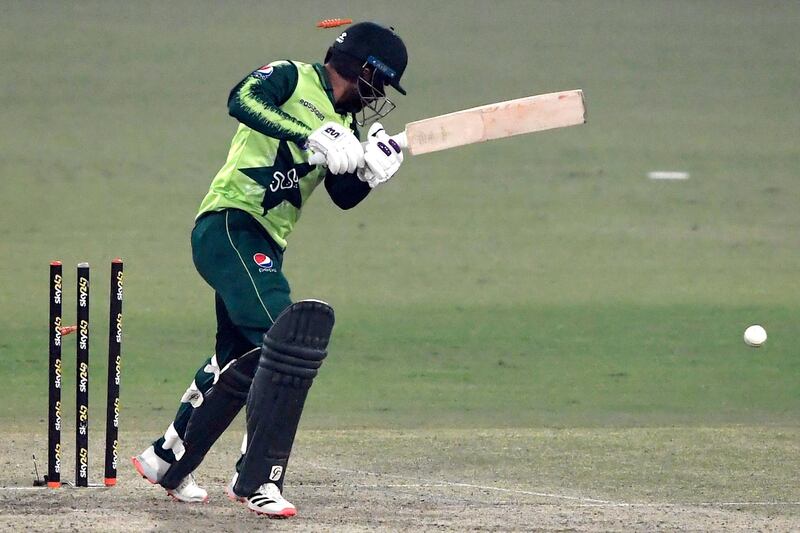 Pakistan's Muhammad Nawaz is bowled out by South Africa's Dwaine Pretorius . AFP