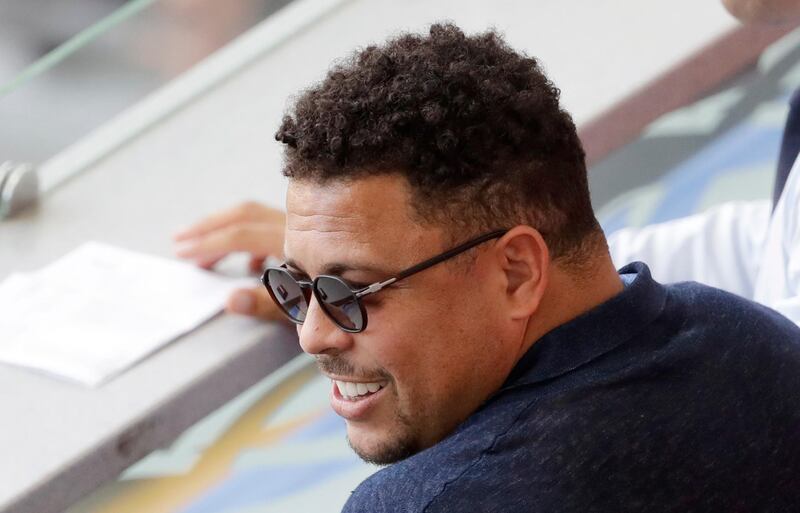FILE - In this June 30, 2018 file photo, Brazil's former player Ronaldo watches a match between France and Argentina, at the 2018 soccer World Cup at the Kazan Arena in Kazan, Russia. Former Brazil striker Ronaldo is taking over recently promoted Spanish club Valladolid. Ronaldo announced Monday, Sept. 3 he has become the majority stakeholder in the small club from northern Spain. The former star says he hopes to bring his soccer expertise to help the club improve and be successful in the top tier of the Spanish league. (AP Photo/Sergei Grits, File)