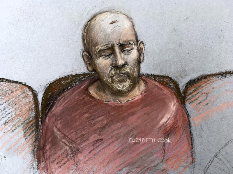 Court artist sketch by Elizabeth Cook, showing serving police constable Wayne Couzens, making his first appearance at the Old Bailey court by video link from Belmarsh top security jail in south London, Tuesday March 16, 2021, where he is charged with the murder and kidnapping of Sarah Everard.  A body found in woodland south of London was identified as 33-year old Sarah Everard, who went missing while walking home on March 3, and serving police officer Couzens stands charged with her kidnap and murder.(Elizabeth Cook/PA via AP)