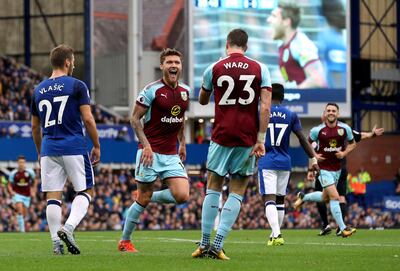 Burnley's Jeff Hendrick celebrates scoring his side's first goal of the game against Everton during the English Premier League soccer match at Goodison Park in Liverpool, England, Sunday Oct. 1, 2017.  (Martin Rickett/PA via AP)