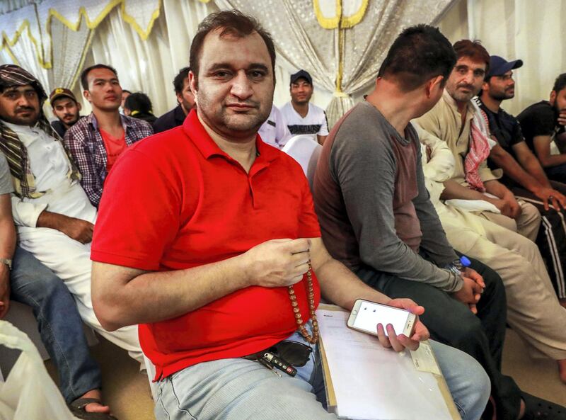 Abu Dhabi, U.A.E., August 1, 2018.
Amnesty seekers at the Shahama Police Centre.  (red)  Majid from Pakistan says some prays at the centre.
Victor Besa / The National
Section:  NA
Reporter:  Haneen Dajani