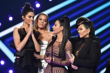 The Kardashians are offering auction winners a chance to appear in their popular reality series. Getty Images