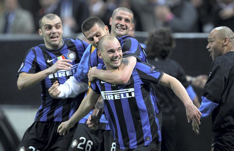 MILAN, ITALY - APRIL 20:  Wesley Sneijder of Inter celebrates his teams third goal during the UEFA Champions League Semi Final 1st Leg match between Inter Milan and Barcelona at the San Siro on April 20, 2010 in Milan, Italy.  (Photo by Julian Finney/Getty Images)