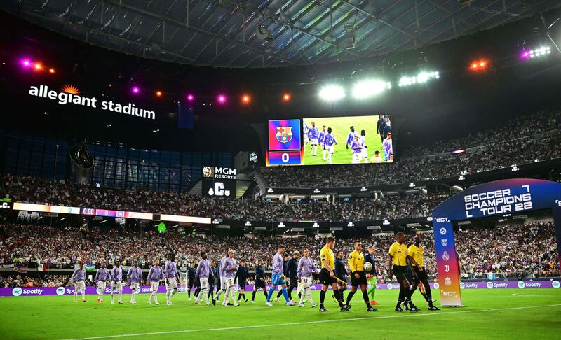 Players take the field for the friendly match between Barcelona and Real Madrid at Allegiant Stadium. AFP