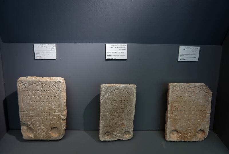Hebrew inscriptions in limestones, dating from the 18th century, are displayed at the exhibition.