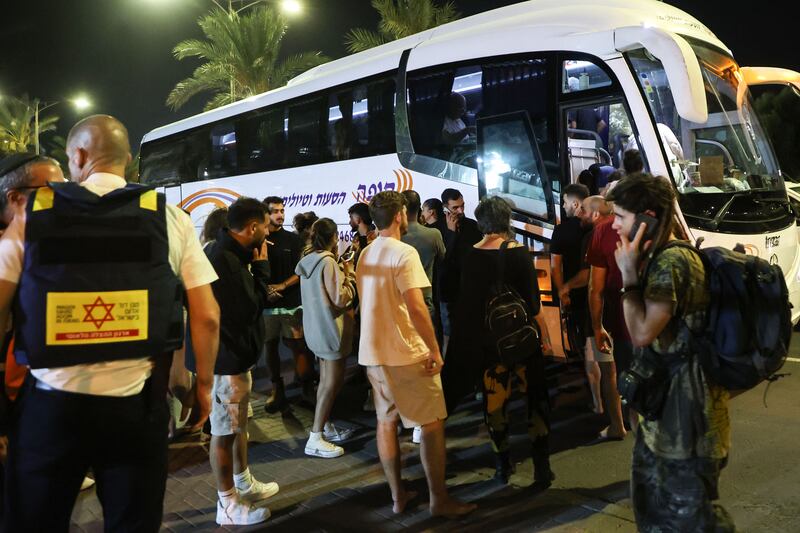 Residents of the Israeli city of Netivot bordering the Gaza Strip wait to be evacuated to central Israel. AFP