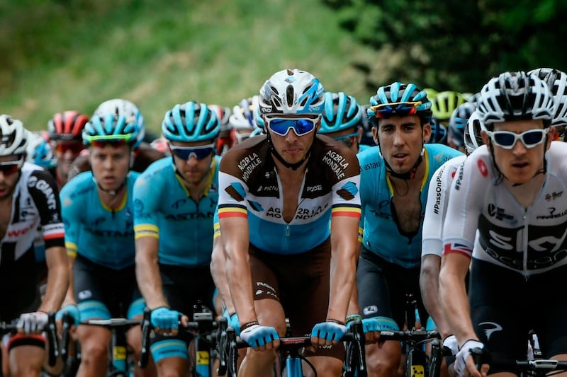 France's Romain Bardet, centre, rides in the pack during the 10th stage of the Tour de France between Annecy and Le Grand-Bornand. Philippe Lopez / AFP
