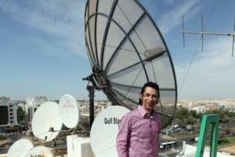 May 6, 2010 / Abu Dhabi / Tariq Chebaro lives in a low rise apartment building in Abu Dhabi and has trouble getting a good satellite signal because of highrise construction near his building May 6, 2010. (Sammy Dallal / The National)