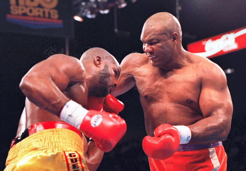 5 NOV 1994:   GEORGE FOREMAN HITS MICHAEL MOORER WITH A RIGHT TONIGHT IN THE EIGHTH ROUND OF THEIR WBA/IBF HEAVYWEIGHT TITLE FIGHT AT THE MGM GRAND IN LAS VEGAS, NEVADA.  FOREMAN KNOCKED OUT MOORER IN THE 10TH TO WIN THE TITLE. Mandatory Credit: Holly Ste