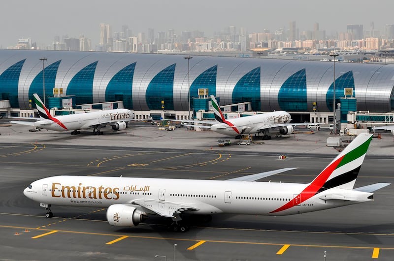 An Emirates plane taxis to a gate at Dubai International Airport in UAE. AP Photo